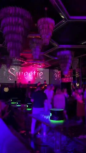 Late-night at a Milan nightclub, inside and out