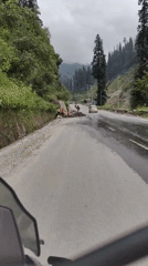 Winding through Burwa's mountain roads on a rainy morning