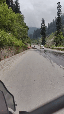 Winding through Burwa's mountain roads on a rainy morning