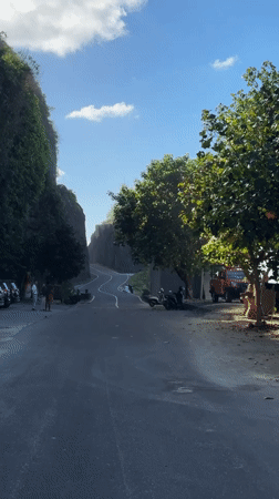 Riding the cliff road down to the Kuta Selatan coast
