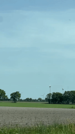 Rural German landscape with wind turbines documented in Bargstedt
