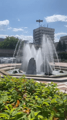 Fountain operates in Blagoevgrad public square on sunny morning
