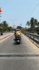 Two motorcyclists spotted on road in Đà Nẵng, Vietnam