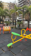 Empty wet playground in Tigre on a grey winter afternoon