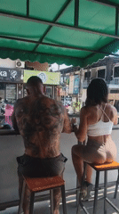 Couple observed at outdoor cafe in บ้านบางรักษ์, Thailand