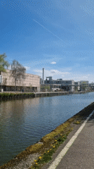 Tranquil canal scene recorded in Nancy on sunny spring day