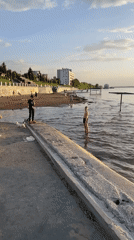 Evening beach activity captured along Volga River in Samara
