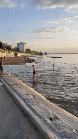 Evening beach activity captured along Volga River in Samara