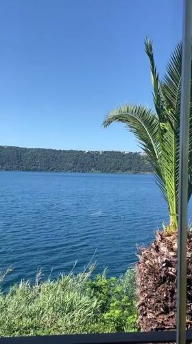 Morning coffee and lake views captured in Castel Gandolfo