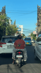 Morning traffic flows through North Kuta streets
