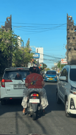 Morning traffic flows through North Kuta streets