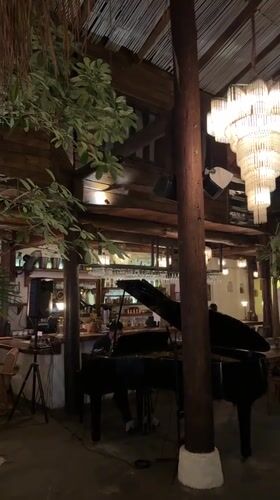 Pianist performs at restaurant in Mengwi, Indonesia