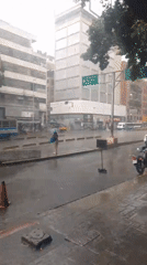 Heavy rainfall creates flooding on Caracas streets April 27