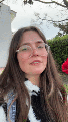 Woman enjoys roses and manicure during afternoon in Montenegro