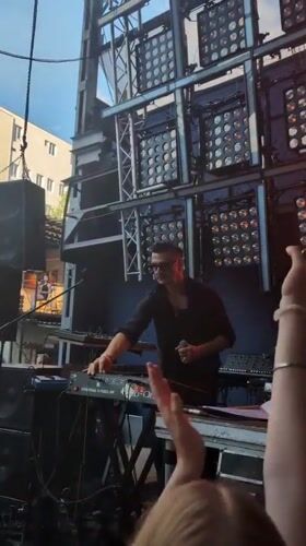 Live stage performance with dancers and a keyboardist in Kyiv