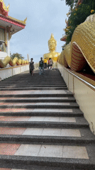 Golden Buddha temple in Pattaya draws visitors and vendors