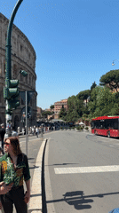 Tourist crowds gather at Rome's Colosseum on sunny Friday
