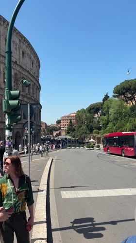 Tourist crowds gather at Rome's Colosseum on sunny Friday