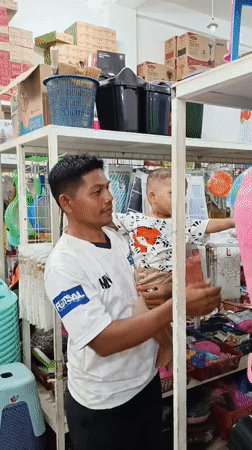 Shops and street food stalls doing regular business in coastal Aceh