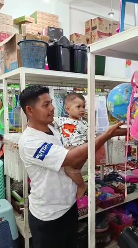 Shops and street food stalls doing regular business in coastal Aceh