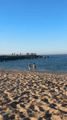 Sunny afternoon draws beachgoers to Arnavutköy Turkey coastline
