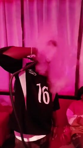 Evening Social Gathering at Nigerian Bar Features Dancing, Hookah