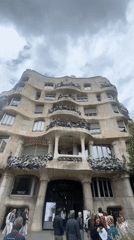 Barcelona observer documents architecture and fashion displays during afternoon walkabout