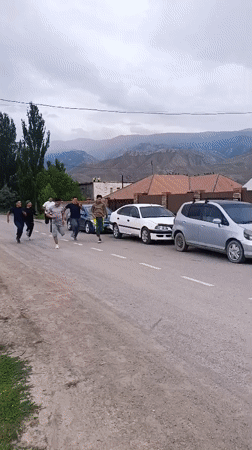 A busy morning across Naryn City, with work and movement in the streets
