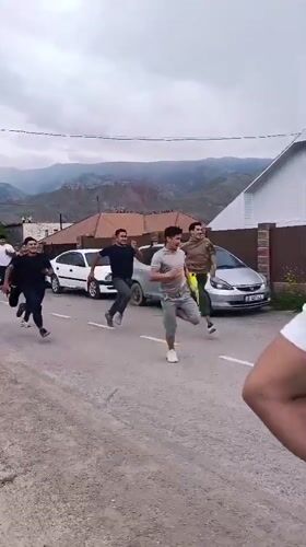 A busy morning across Naryn City, with work and movement in the streets
