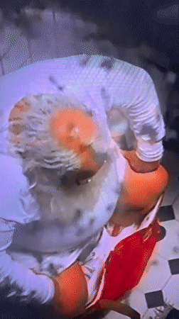 Person in Santa costume filmed in Cannes bathroom