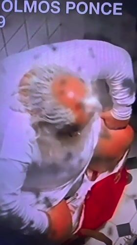 Person in Santa costume filmed in Cannes bathroom