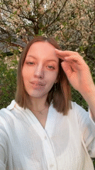 Family documents spring evening in Russian town with flowers, selfies