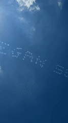 Skywriting message drifts over NYC the day before July 4th