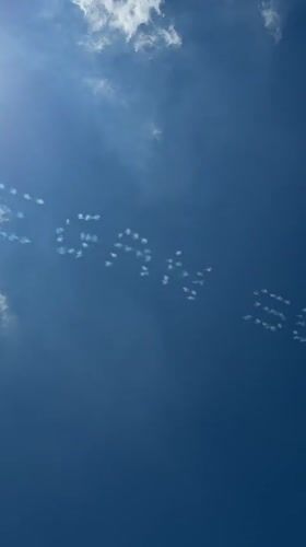 Skywriting message drifts over NYC the day before July 4th