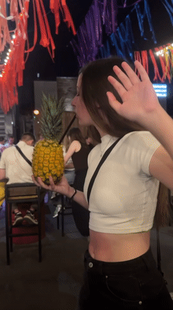 Pineapple drinks and party lights at a Kemerovo outdoor gathering