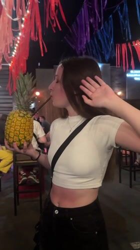 Pineapple drinks and party lights at a Kemerovo outdoor gathering