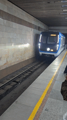 Subway train arrives at Tashkent station platform