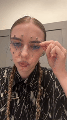 Woman in patterned shirt observed in Krasnoyarsk