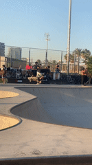 Skateboarder pulls tricks in a Barcelona bowl park