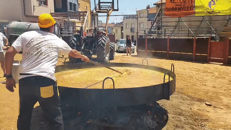 Giant paella cooks over open fire in Sobradillo, Spain