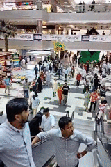 Inside a busy Dhaka shopping mall with Cafe Amazon