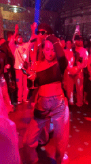 DJ performs at Moscow nightclub amid dancing crowd