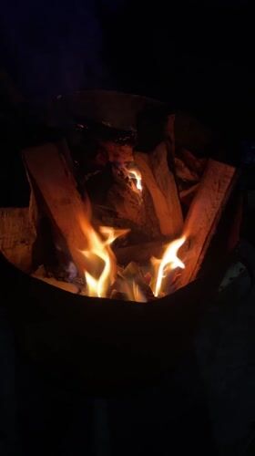 Traditional Nepali meal with fire pit observed in Dhampus Phedi