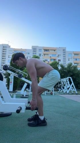 Man exercises at outdoor gym in Blagoevgrad park