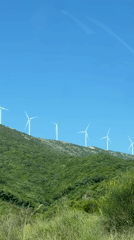 Wind turbines operate on hilltop near Ulcinj, Montenegro