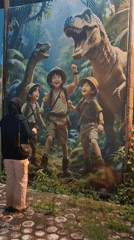 Woman photographs new dinosaur-themed tourism signs in Lhokseumawe