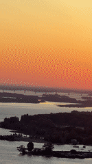 Volga River sunset captured from ground, air, and apartment windows