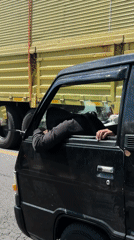 Black pickup truck stops on Tabanan street, driver observed