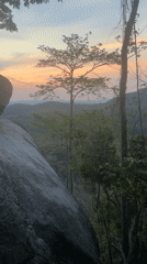 Campers gather for outdoor activities at Thai mountain site
