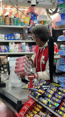 Convenience store transaction and botanical photography captured simultaneously